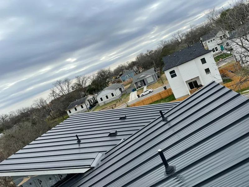 Standing seam metal roof panels with vents for Skylight Repair in Hunters Creek